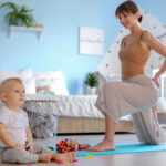 Mother engaging with toddler while managing breastfeeding and milk storage routine